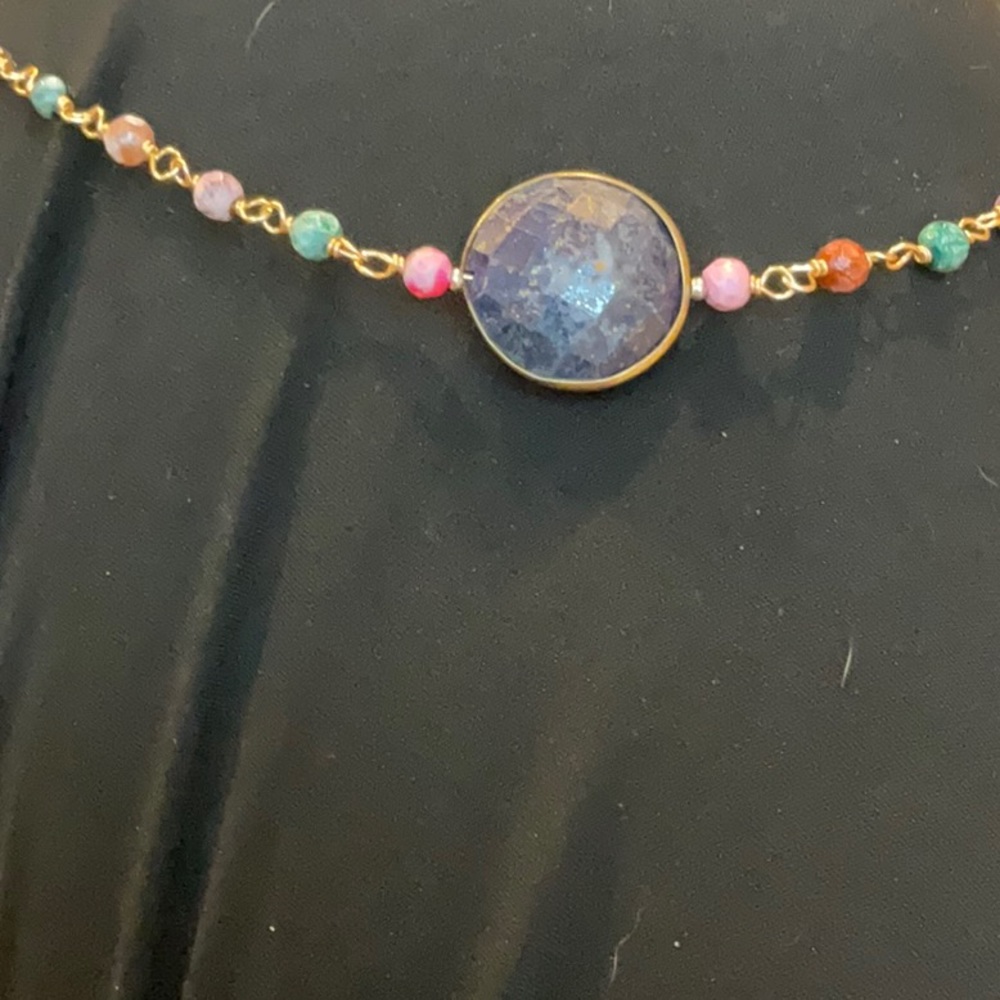 Nakomal Chicago handmade necklace with dark purple center stone